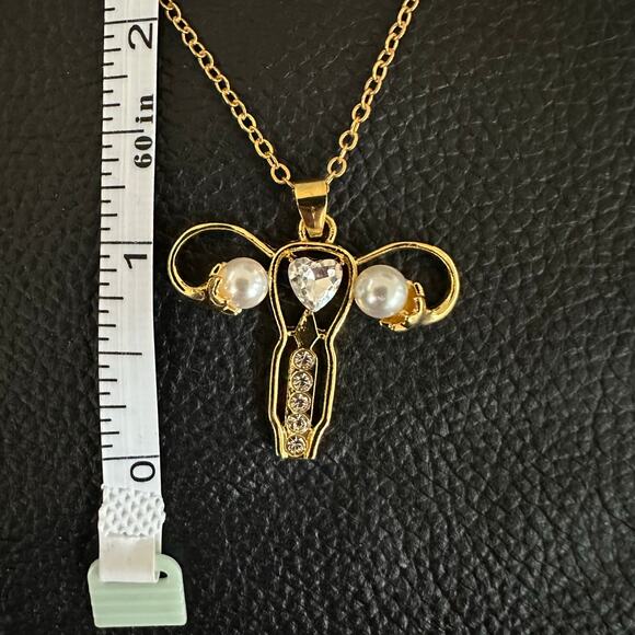 Woman’s Uterus Gold tone Necklace - Picture 3 of 4